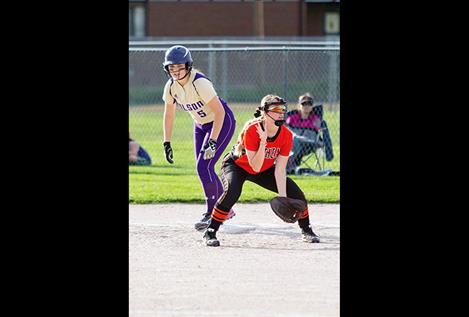 Lady Pirate Quinn Motichka looks to steal second base.