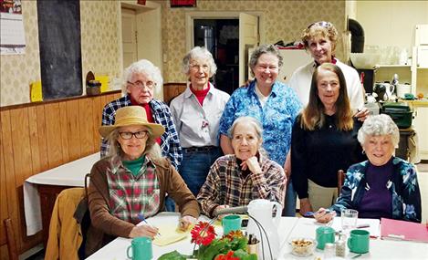 Some of the Yellow Bay Ladies Auxiliary members planning this year’s festival posed recently for a photo. From front left are: Jackie McCoy, Anita Hunter, Virginia Hankins; back row, left: Carol Johnson, Shari Myers, Nancy Tiensvold, Marie Mitchell and Kathy Robertson.