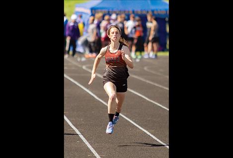 Ronan Maiden Kinsely Barney sprints to a first-place finish in the 100-meter.