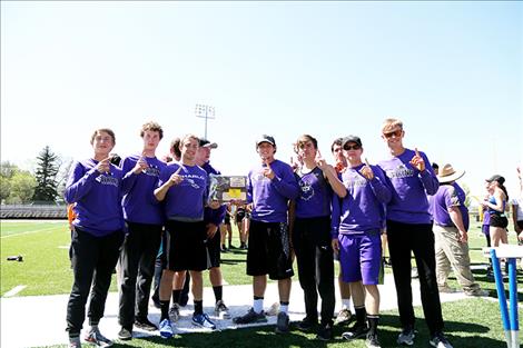 The Charlo Vikings track team poses with their first place district 14C trophy.