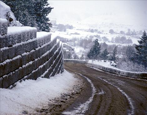 A surprise April snow storm blankets the Skyline Drive construction site and turns the dirt road to mud. The last phase of construction starts April 15.