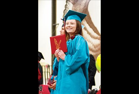 Alexia Parizeau poses with her diploma.