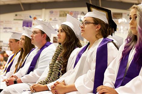 Charlo's class of 2018 listens intently as a  former teacher gives the commencement address.