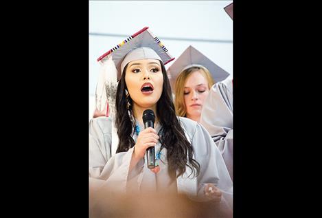  Laurencia Starblanket sings the "Star Spangled Banner."