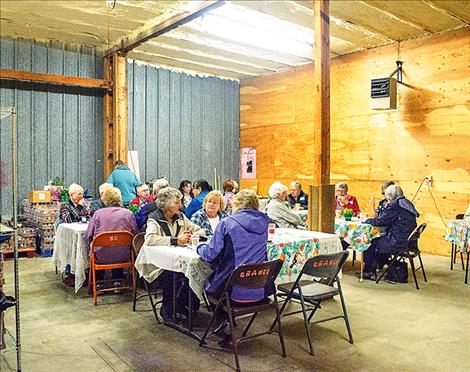 People gather at an appreciation celebration located at the Bread Basket.