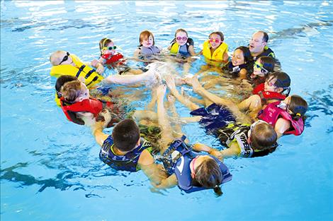 Polson  second-grade  students learn to swim due to a collaboration between  Mission Valley  Aquatics, the  Greater Polson Community  Foundation, and  Polson School District.