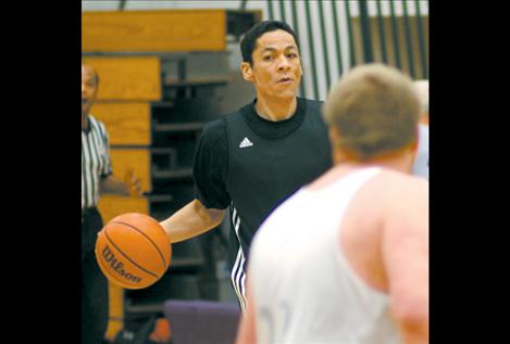 JR Camel drives down the court during his team’s second game of the tournament