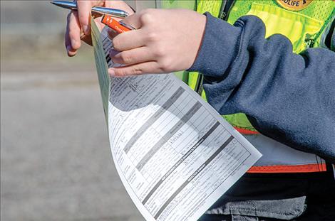 People are given a receipt after the inspection.