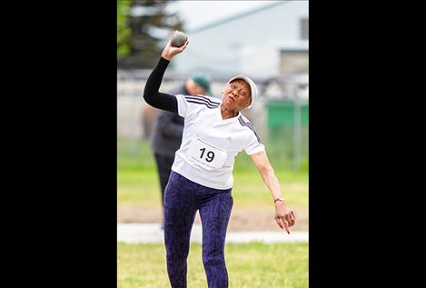 Alaete Fish competes in shot put.