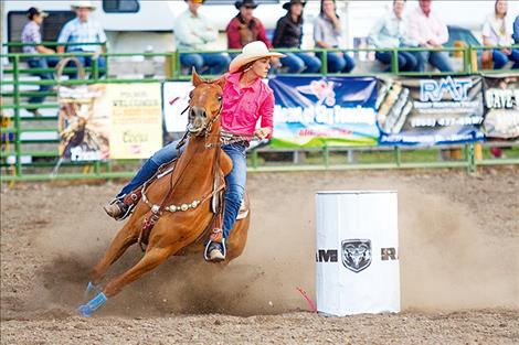 Abby Knight races to a first place win in the barrels.