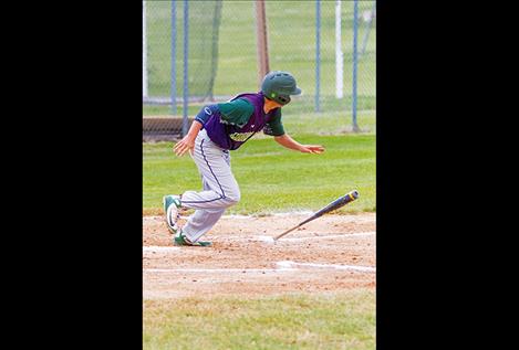 Mariner James Bennett lays down a bunt.