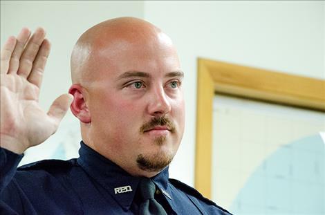 Ronan Police Officer Corey White takes the oath.