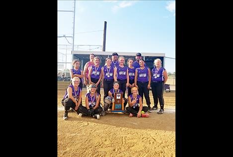 The 12U Purple Wave pose for a photo after taking second overall at the Montana USA Junior Olympic State Softball Tournament June 8 in Great Falls. 