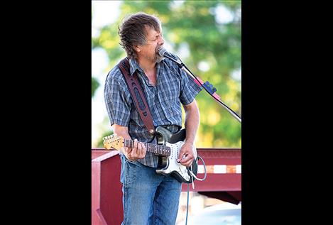 Ken Sederdahl of the Kenny James  Miller Band  entertains the crowd.