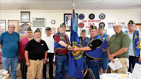 From left to right are Post members Dale Morgan, Service Officer Penrod Davis, Junior Shooting Sports Chairman Melvin Quakenbush, Finance Officer Hank Dolezal, Commander Glen Sharbono, Chaplain Ed Cornelius, Past Commander Jack Fay, Vice Commander Tom Leafty, Visiting Department Vice Commander Jeff Nelson and Highway Fatality Marker Chairman Jerry Fisher.