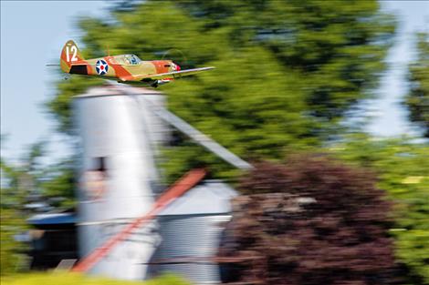 A P40 makes a low high-speed pass. 