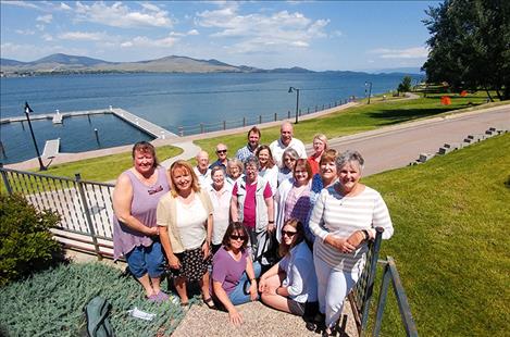 eater Polson Community Foundation board president Toni Young, right, stands with recipients of award grants at Sacajawea Park in Polson.