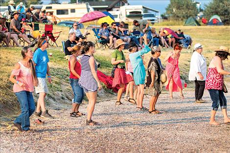 Bluesy beats get listeners on their feet as the sun sets at the Regatta Fairgrounds.