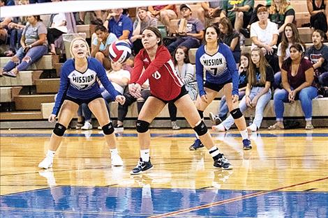 Lady Bulldog River Gonzalez bumps the ball.