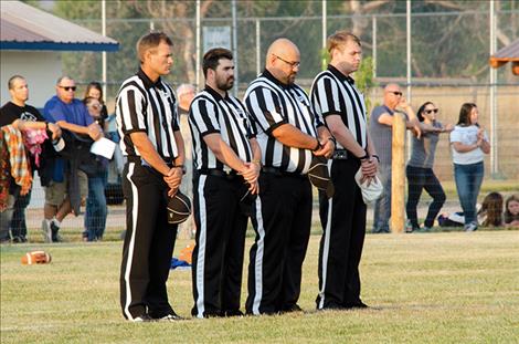  Football  referees honor  the heroes.   