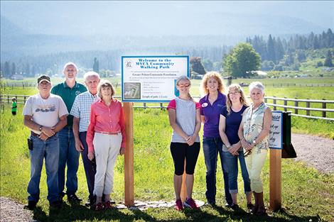 Pictured next to the walking path from left are: Lawrence Fry, MVCA Director Christian Bumgarner, Dave Abell, Penny Jarecki, Raina Stene, Shauna Rubel, Annette Schiele and Dorthy Ashcroft. 