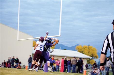 A great Vikings' catch precedes a touchdown during Charlo's homecoming game.