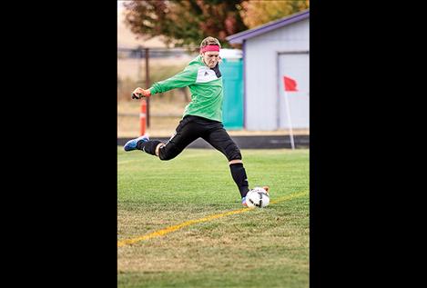 Pirate goal keeper Xavier Stalkfleet kicks the ball down field.