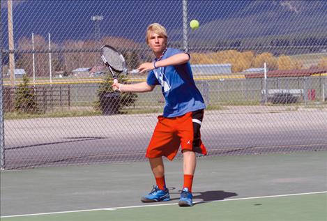 Robbie Erickson smacks a ball back over the net toward an opposing player. Erickson is one of Mission’s rising stars in the young program.