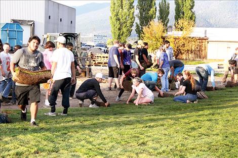 Ronan students put sod down at the Boys and Girls Club of the  Flathead  Reservation  and Lake County last week  at the new  location where Total Home was once located.  