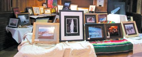 Silent auction items and art from last year’s event, pictured above, raised more than $1,500 and 700 pounds of food for the local food pantry. Proceeds from this year’s show will benefit the Ronan Volunteer Fire Department.