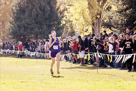 Lady Pirate Bea Frissell races to her second consecutive state title.