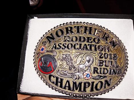 Payton Fitzpatrick of Polson, far right, won the 2018 NRA bull riding championship Oct. 6 in Butte.