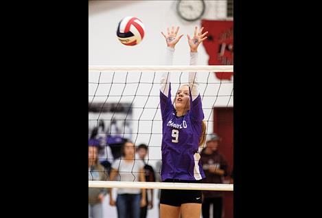 Lady Viking Carlee Fryberger keeps her eyes on the ball.