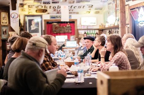 Guests enjoy conversation at the Montana Brewery Museum located above Total Screen Design in Polson.