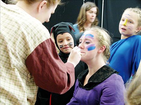 Amelia Lamont prepares to go on stage as the "Queen" in Missoula Children's Theatre production of "Snow White" seen on the stage in Arlee Saturday.