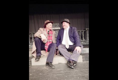 Matt Sisler (as George Bailey) and Dana Grant (as Clarence the Angel) rehearse a scene from “It’s A Wonderful Life.” 