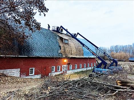 The Red Barn in St. Ignatius gets a new roof. 