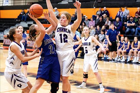 Lady Viking Liev Smith blocks a defender's shot. 