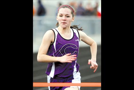 Jordan Bilile nears the finish in the 100.