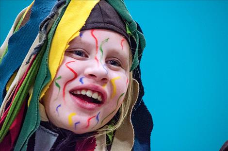 Children in the  Ronan School District,  which includes Pablo  Elementary, K. William  Harvey, Ronan Middle  School and Ronan High School, perform a play  on Friday night.  