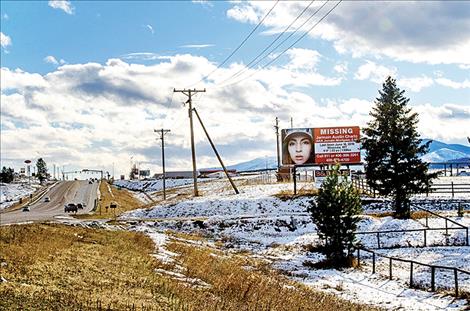 A billboard on U.S. Highway 93 outside of Missoula features a photo of Jermain Charlo who went missing in June.  