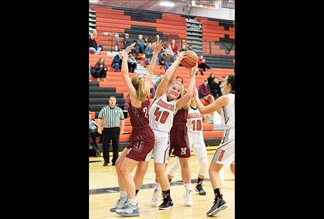 Ronan Maiden Jaylea Lunceford grabs a rebound.