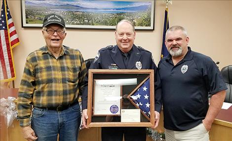 Courtesy photo Former Polson Police Chief Ron Buzzard stands with retiring Assistant Police Chief John Stevens and current Police Chief  Wade Nash. Buzzard hired Stevens 30 years ago.