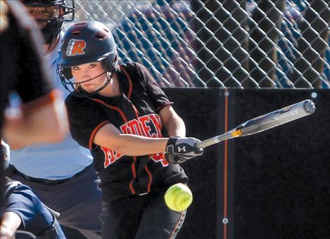 Ronan freshman Jordyn Clairmont smacks a grounder during the Maidens’ game against the Powell County Lady Wardens last week. Ronan won the game 6-5. 