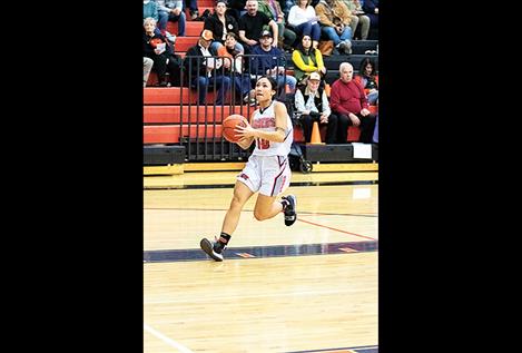 Maiden Tiana Ulutoa heads for a score.