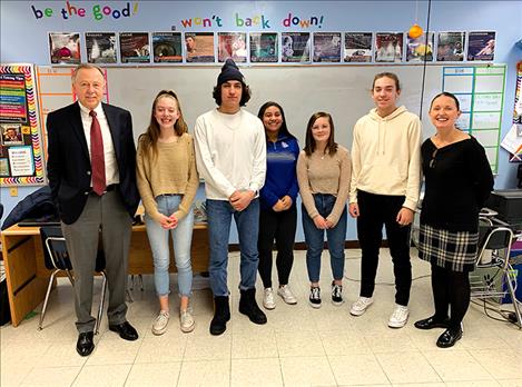 St. Ignatius High School students celebrate iGraduate with visiting officials, including Angela McLean.