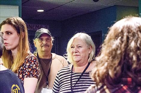 Kristin and Dale Nelson exit the theater after seeing their 37th film during the festival.