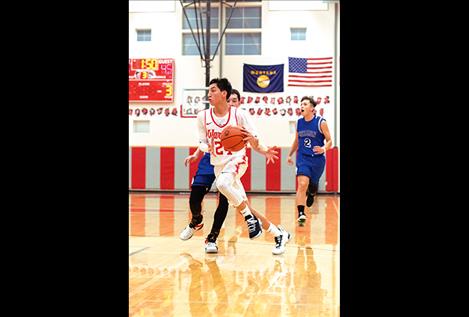  Warrior David Haynes sprints to the hoop.