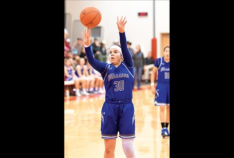 Lady Bulldog Azia Umphrey shoots a couple at the charity stripe.