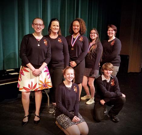 Ronan Speech and Debate team state tournament attendees include: back row,  Aurrora Watkins, senior; Coach Michelle Mallon; Kara Holmlund, senior; Sariel Sandoval,  sophomore; and Taylor Jackson, sophomore. Krya Waldoch and d’Artagnan  Dominguez are seated in front. 